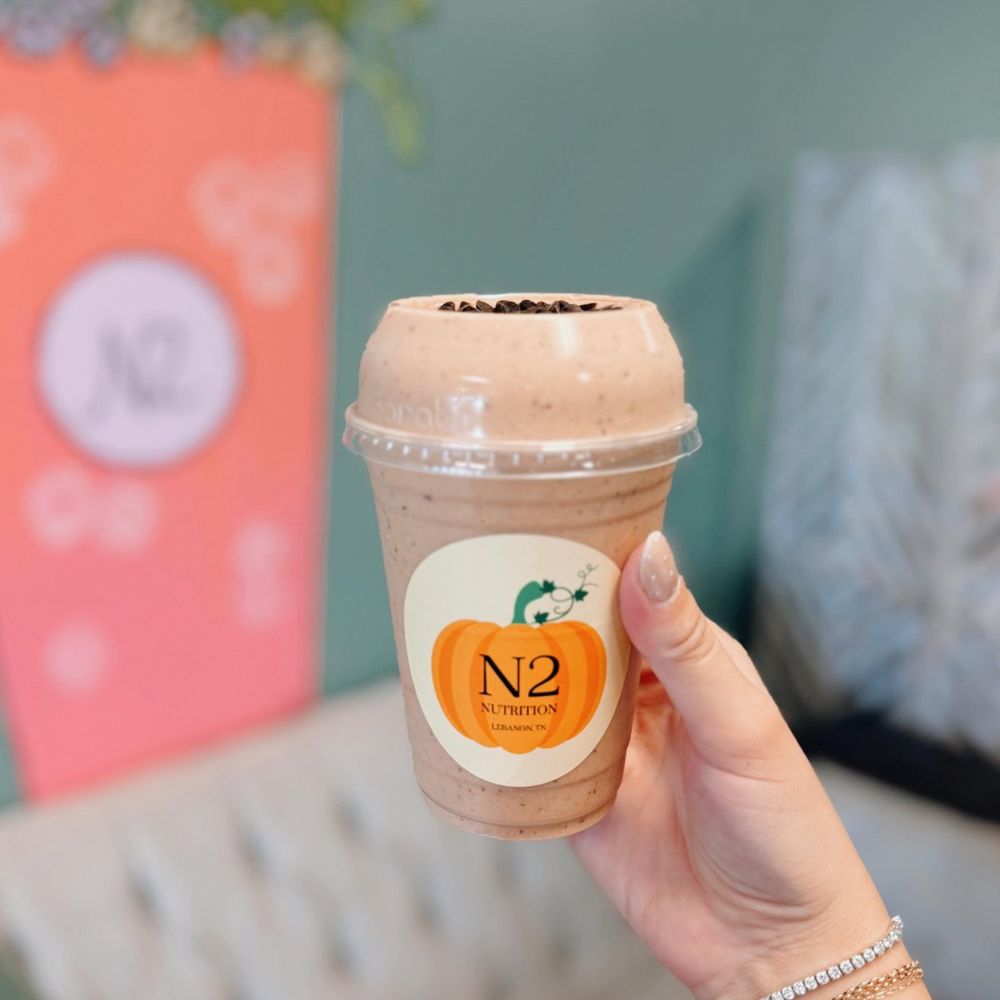 An N2 protein shake in a dome-lid cup